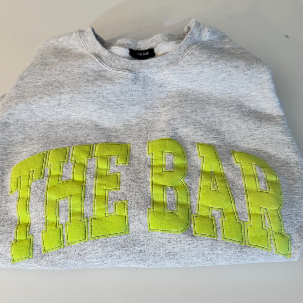 DRAMATIC BUBBLE LETTERED "THE BAR" SWEATSHIRT
NEW… - image 1